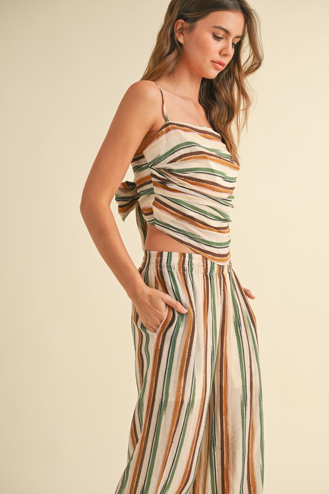 Anika strips top