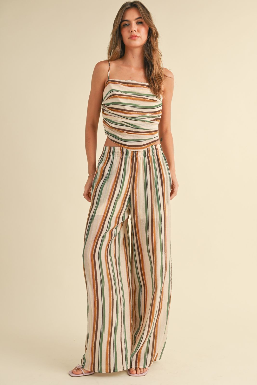 Anika strips top