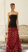 Strapples back with red bottom dress